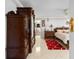 Ornate main bedroom boasts large wardrobe and an ensuite bathroom at 8518 Delaware Dr, Weeki Wachee, FL 34607