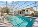 Large screened-in pool area, offering a perfect blend of indoor-outdoor living and beautiful views at 8518 Delaware Dr, Weeki Wachee, FL 34607