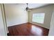 Bedroom with ceiling fan and sleek wood flooring at 8906 Iron Oak Ave, Tampa, FL 33647