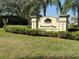 Brentwood Village entrance sign surrounded by manicured landscaping at 8906 Iron Oak Ave, Tampa, FL 33647