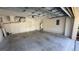 Spacious two car garage featuring plenty of room for parking and storage needs at 8906 Iron Oak Ave, Tampa, FL 33647