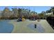 Community playground offering various play structures and a soft, padded surface at 8906 Iron Oak Ave, Tampa, FL 33647