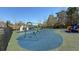 Community playground with swings and slides in a safe, fenced-in area at 8906 Iron Oak Ave, Tampa, FL 33647