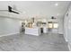 Open concept living space with a modern kitchen featuring stainless steel appliances at 10047 41St N St # 10047, Pinellas Park, FL 33782