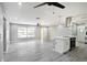 Bright living space with kitchen island and updated stainless steel appliances at 10047 41St N St # 10047, Pinellas Park, FL 33782