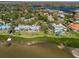 Waterfront condo with dock access, lush landscaping, and charming community at 1111 N Bayshore Blvd # F11, Clearwater, FL 33759