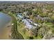 Scenic aerial showcasing condos with stunning water access amid lush greenery at 1111 N Bayshore Blvd # F11, Clearwater, FL 33759