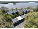 Overhead angle of condos featuring ample parking and lush trees at 1111 N Bayshore Blvd # F11, Clearwater, FL 33759