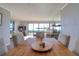 The dining area features an open layout and water views from the dining table at 1111 N Bayshore Blvd # F11, Clearwater, FL 33759