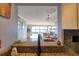 Kitchen view looking into the open-concept living room with water views at 1111 N Bayshore Blvd # F11, Clearwater, FL 33759