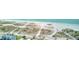 Beautiful aerial view of the beach showing soft sand and the ocean at 12055 3Rd E St # 103, Treasure Island, FL 33706