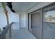 Balcony offers a glimpse of the waterfront and a bright sunny view at 12055 3Rd E St # 103, Treasure Island, FL 33706