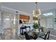 Inviting living and dining area with an open layout that offers a breakfast bar at 12055 3Rd E St # 103, Treasure Island, FL 33706