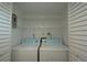 Efficient laundry closet with washer and dryer at 12055 3Rd E St # 103, Treasure Island, FL 33706