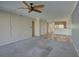 Inviting living area with soft carpeting and neutral tones at 12055 3Rd E St # 103, Treasure Island, FL 33706
