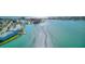 Panoramic aerial view of the waterfront property, showcasing the deep water access at 12055 3Rd E St # 103, Treasure Island, FL 33706