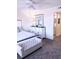Bedroom showcasing stylish dresser and a comfortable seating bench at 12760 Indian Rocks Rd # 1066, Largo, FL 33774