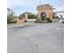 Gated community entrance with palm trees and manicured landscaping at 12760 Indian Rocks Rd # 1066, Largo, FL 33774