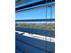 View of the blue sky and water seen through the closed blinds at 12760 Indian Rocks Rd # 1066, Largo, FL 33774