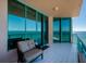 Inviting balcony with outdoor seating and breathtaking ocean views at 1560 Gulf Blvd # 1104, Clearwater Beach, FL 33767