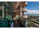 Turquoise balcony with view of the waterway and clear blue skies at 1560 Gulf Blvd # 1104, Clearwater Beach, FL 33767