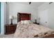 Comfortable bedroom with bedside tables, lamps, and a beautifully decorated bed at 1560 Gulf Blvd # 1104, Clearwater Beach, FL 33767