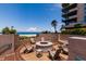 Communal fire pit with comfortable seating area to enjoy ocean views at 1560 Gulf Blvd # 1104, Clearwater Beach, FL 33767