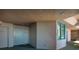 Hallway view showcasing the well-maintained exterior door and a window at 1560 Gulf Blvd # 1104, Clearwater Beach, FL 33767