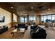 Comfortable living room with patterned carpet, two sofas, bar, and ocean views at 1560 Gulf Blvd # 1104, Clearwater Beach, FL 33767