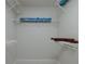 Well-organized walk-in closet with metal shelving at 1560 Gulf Blvd # 1104, Clearwater Beach, FL 33767