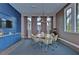 Stylish conference room featuring modern lighting, comfortable seating, and a large window at 17805 Everlong Dr, Land O Lakes, FL 34638