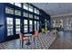 Stylish lounge area with elegant seating and scenic lake views at 17805 Everlong Dr, Land O Lakes, FL 34638