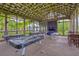 Spacious recreation area with ping pong tables and seating, perfect for leisure and entertainment at 17805 Everlong Dr, Land O Lakes, FL 34638