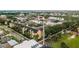 Aerial view of a colorful apartment complex featuring well-maintained landscaping and ample parking at 1810 E Palm Ave # 7104, Tampa, FL 33605