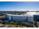 Waterfront condo building featuring multiple stories and stunning views of the intercoastal waterway at 1868 Shore S Dr # 411, South Pasadena, FL 33707