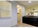 View of a hallway leading to other rooms, showcasing the house's layout and open floor plan at 2153 Broadway View Ave, Brandon, FL 33510