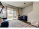 Bright and airy living room with access to the patio, hardwood floors, and stairs at 2153 Broadway View Ave, Brandon, FL 33510