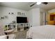 Spacious bedroom with a cozy chair, shelving, and a media center at 2153 Broadway View Ave, Brandon, FL 33510