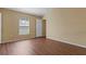 Bedroom with closet, natural lighting and neutral walls and flooring at 2156 Deltona Blvd, Spring Hill, FL 34606