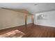 Living space with laminate flooring and an open layout at 2156 Deltona Blvd, Spring Hill, FL 34606