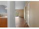 Spacious living room with laminate floors and sliding glass doors to the backyard at 2156 Deltona Blvd, Spring Hill, FL 34606