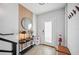 Bright foyer featuring a decorative mirror and a modern console table with decor at 2705 N Boulevard # 2, Tampa, FL 33602