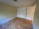 Bedroom with laminate floors, double closet and plenty of natural light at 2787 Keystone Rd, Tarpon Springs, FL 34688