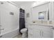 Bright bathroom with tub, shower, and single sink vanity at 2808 N Florida Ave, Tampa, FL 33602