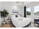 Bright bedroom with a view, a bed, and decor at 2808 N Florida Ave, Tampa, FL 33602