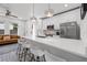 Open-concept kitchen flows into a bright living space, complete with stainless steel appliances and a large island at 2808 N Florida Ave, Tampa, FL 33602