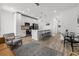 Open-concept kitchen with stainless steel appliances, island with breakfast bar, and modern finishes at 2808 N Florida Ave, Tampa, FL 33602