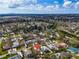 An aerial view of the neighborhood with mature trees, and easy access to city at 309 84Th Ne Ave, St Petersburg, FL 33702