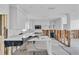 Kitchen in renovation stage with white cabinetry, countertops, and exposed walls at 309 84Th Ne Ave, St Petersburg, FL 33702