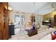 Cozy living room with French doors, tile floors, and neutral decor at 3416 Fairfield Trl, Clearwater, FL 33761